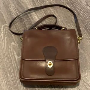 The real deal vintage Coach saddle bag